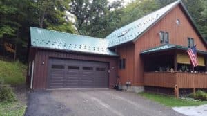 28x24x10 post frame garage with Ivy Green roofing, Brown siding_Honeoye, NY