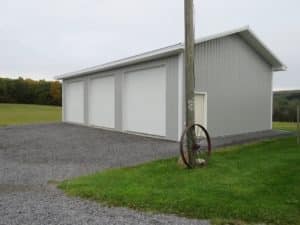 28x48x12 pole building with 2' overhangs, Gray siding, Brite White trim_Branchport, NY