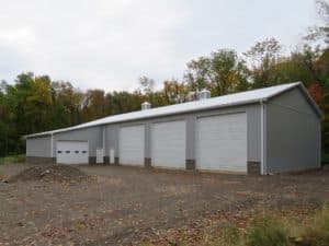 48x104x16 pole building with 1' overhangs, Gray siding, Brite White roofing and trim_Sodus, NY