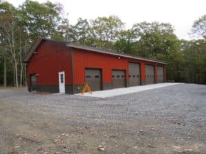 40x80x14 pole building with 2_ overhangs, Barn Red siding, Burnished Slate roofing and trim_Bristol, NY