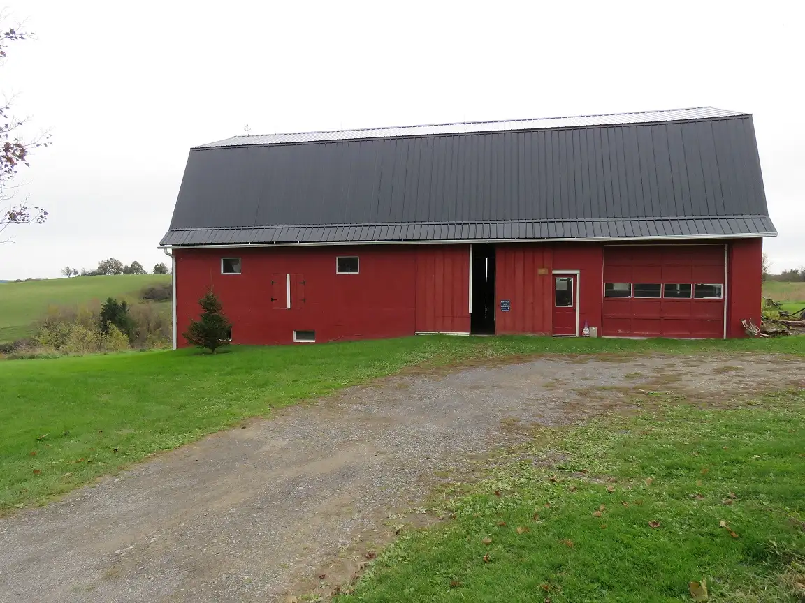 Barn re roof with Black roofing_Bloomfield, NY